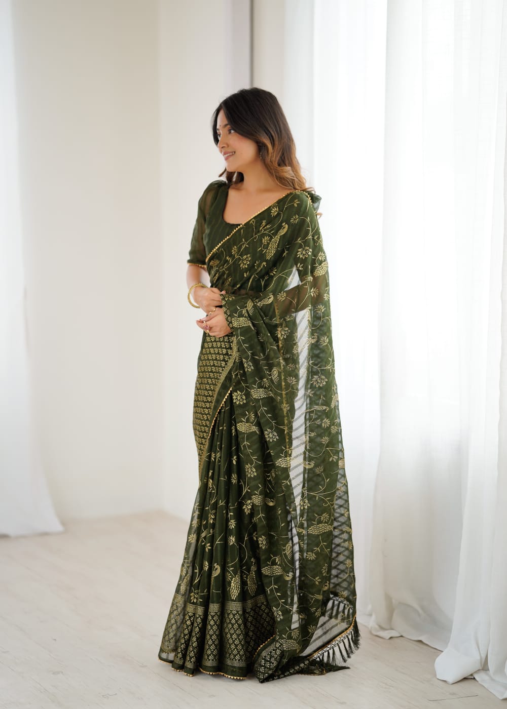 Elegant Mehandi Color Georgette Party Wear Saree with Foil Print & Fancy Zalar Lace