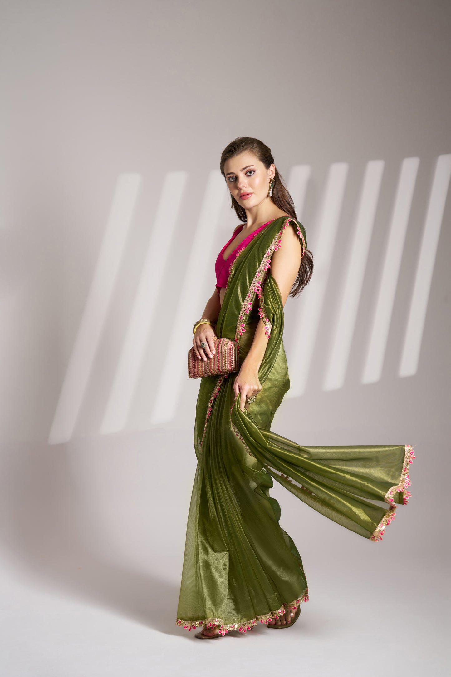 Green Color twill net saree with designer lace and unstitched blouse