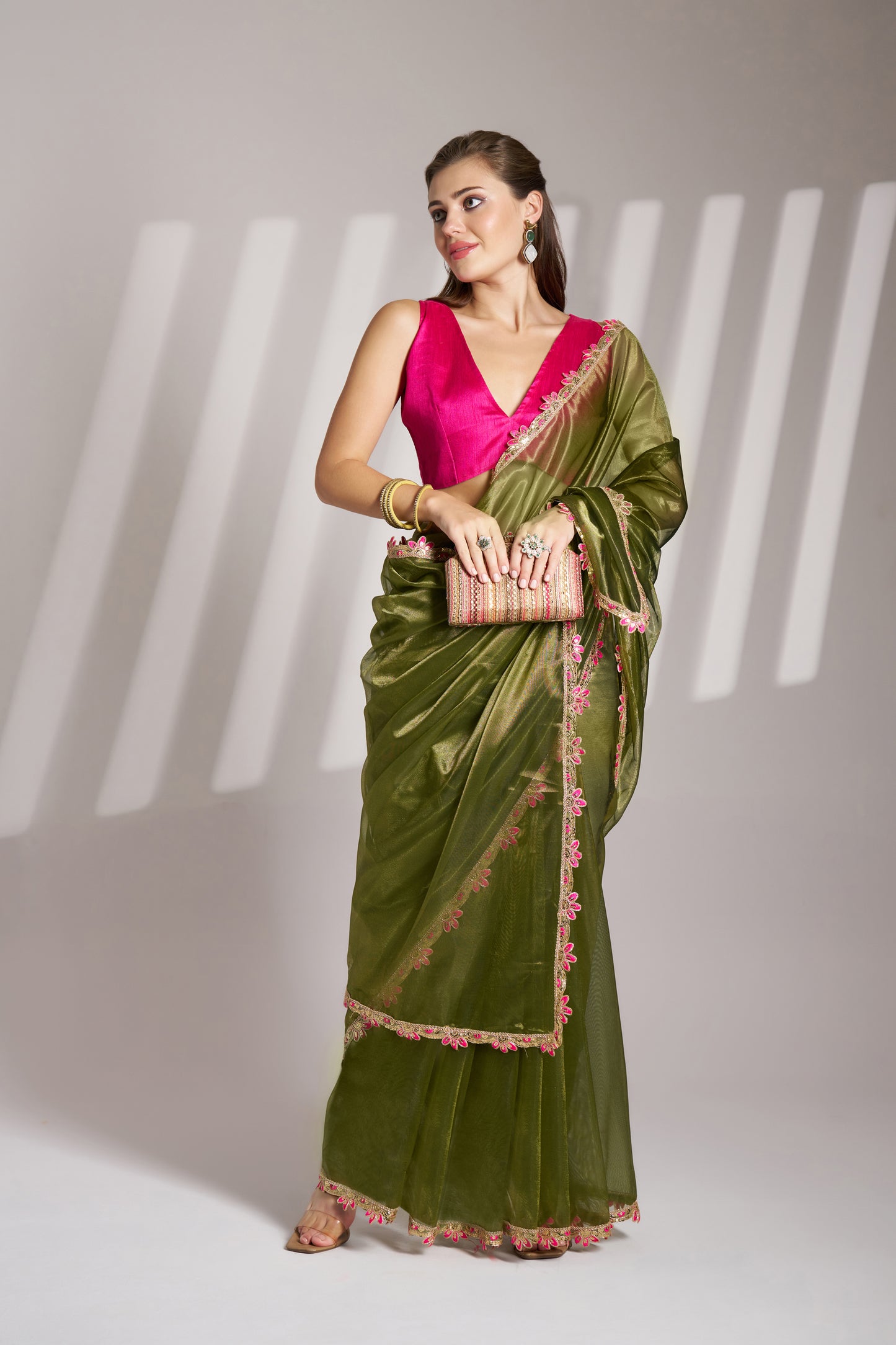 Green Color twill net saree with designer lace and unstitched blouse
