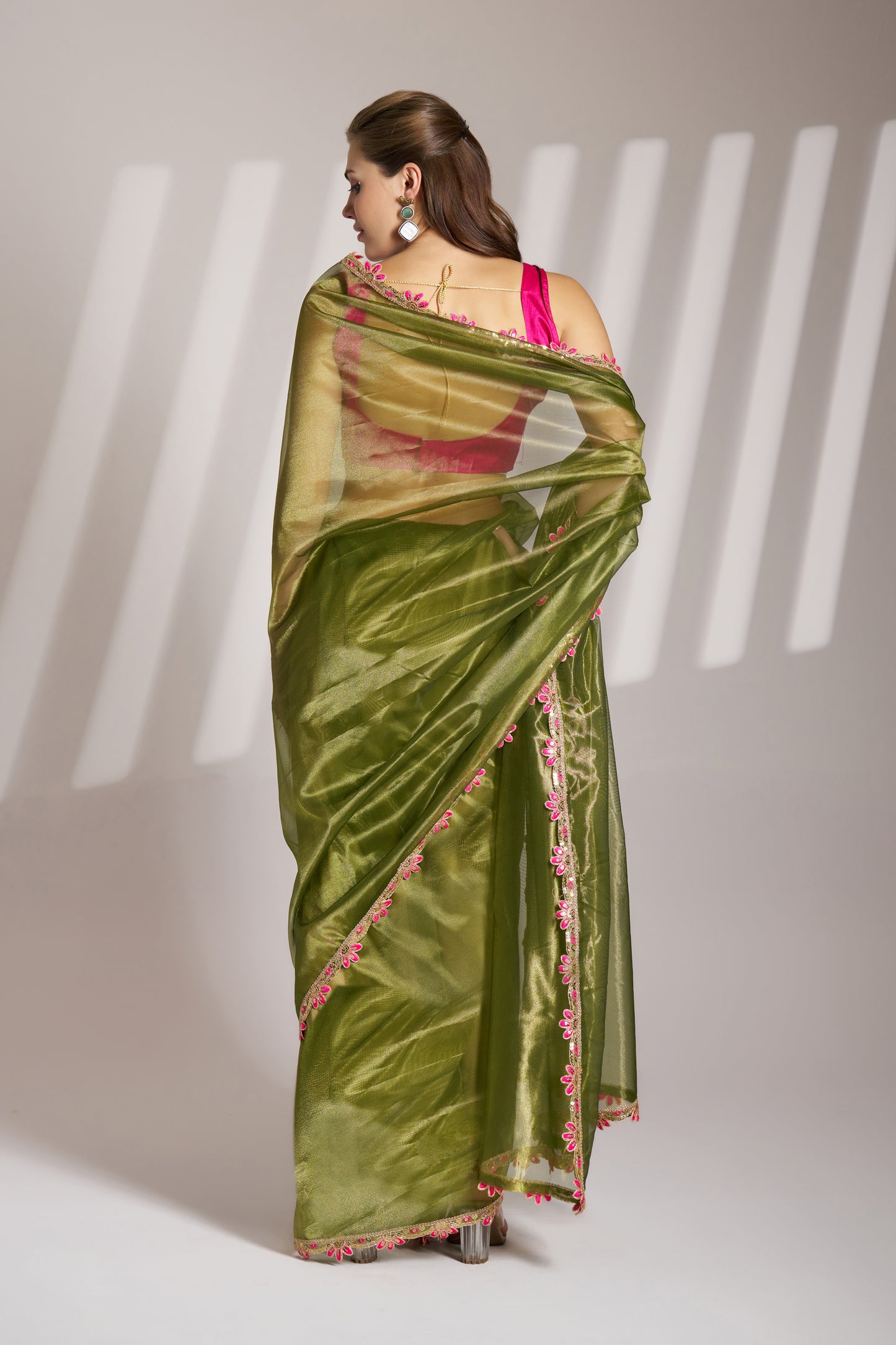 Green Color twill net saree with designer lace and unstitched blouse