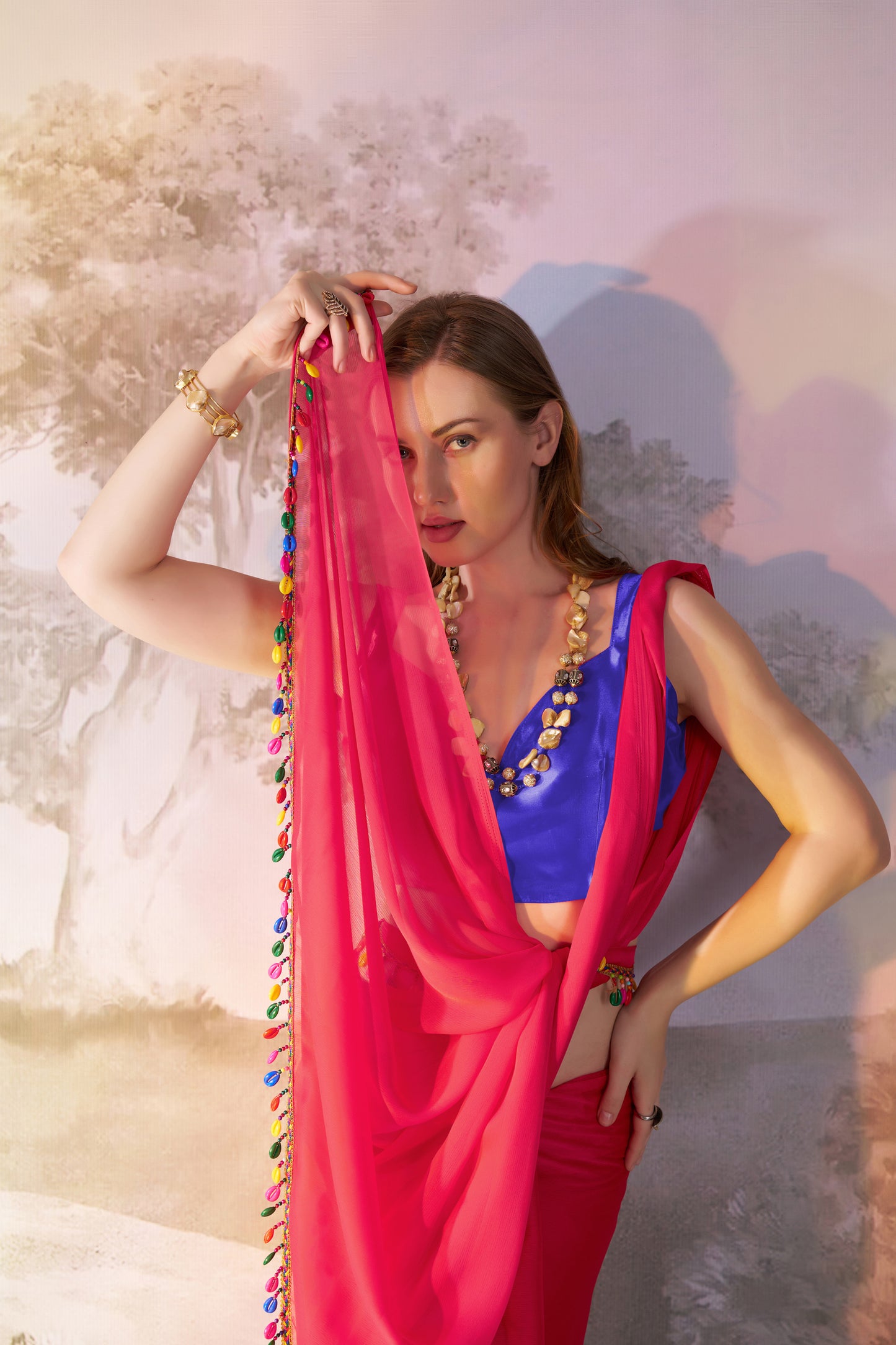 Red color chiffon fabric saree with designer lace and unstitched blouse