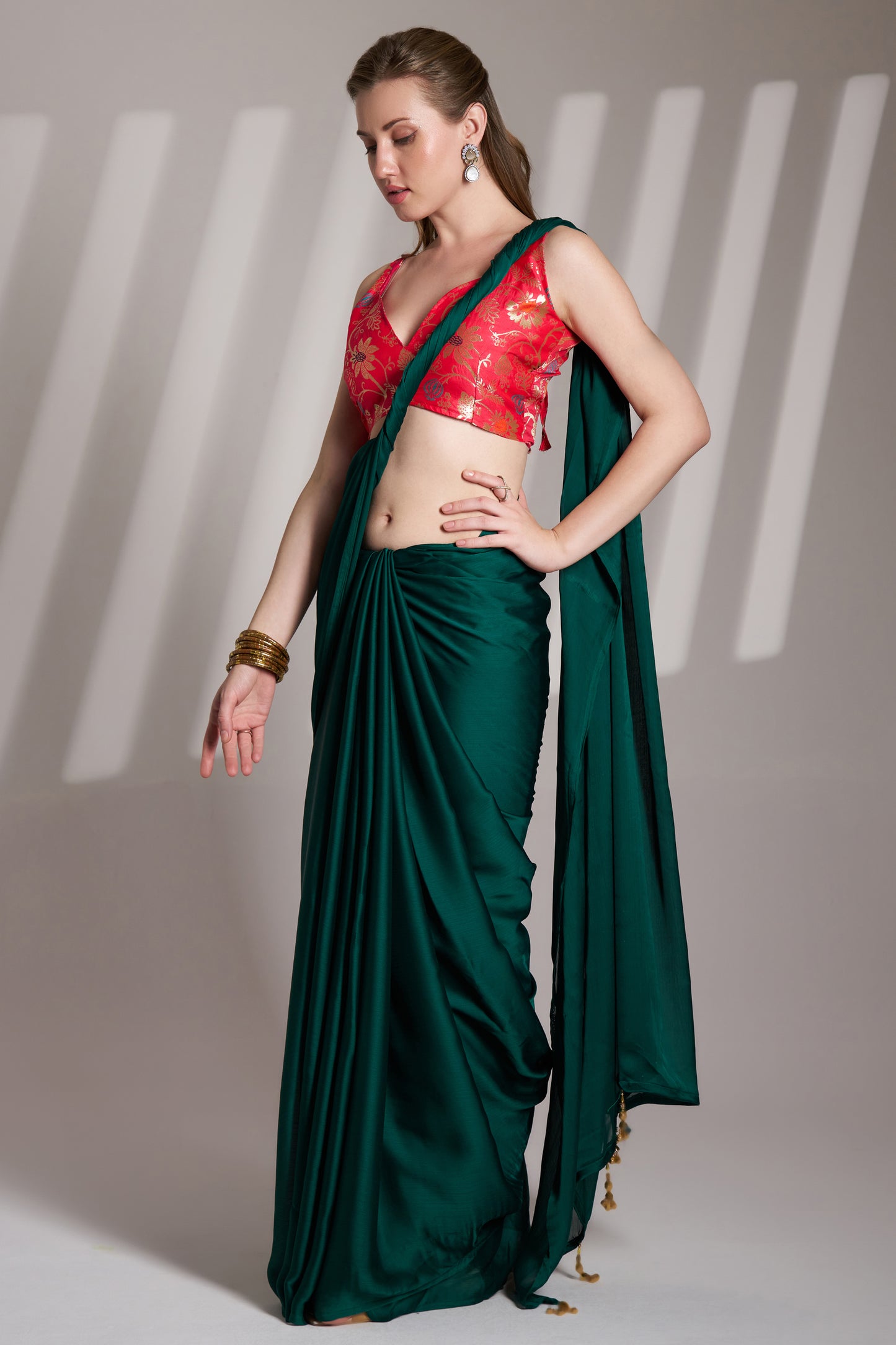 Green color chiffon fabric saree with designer lace and unstitched blouse