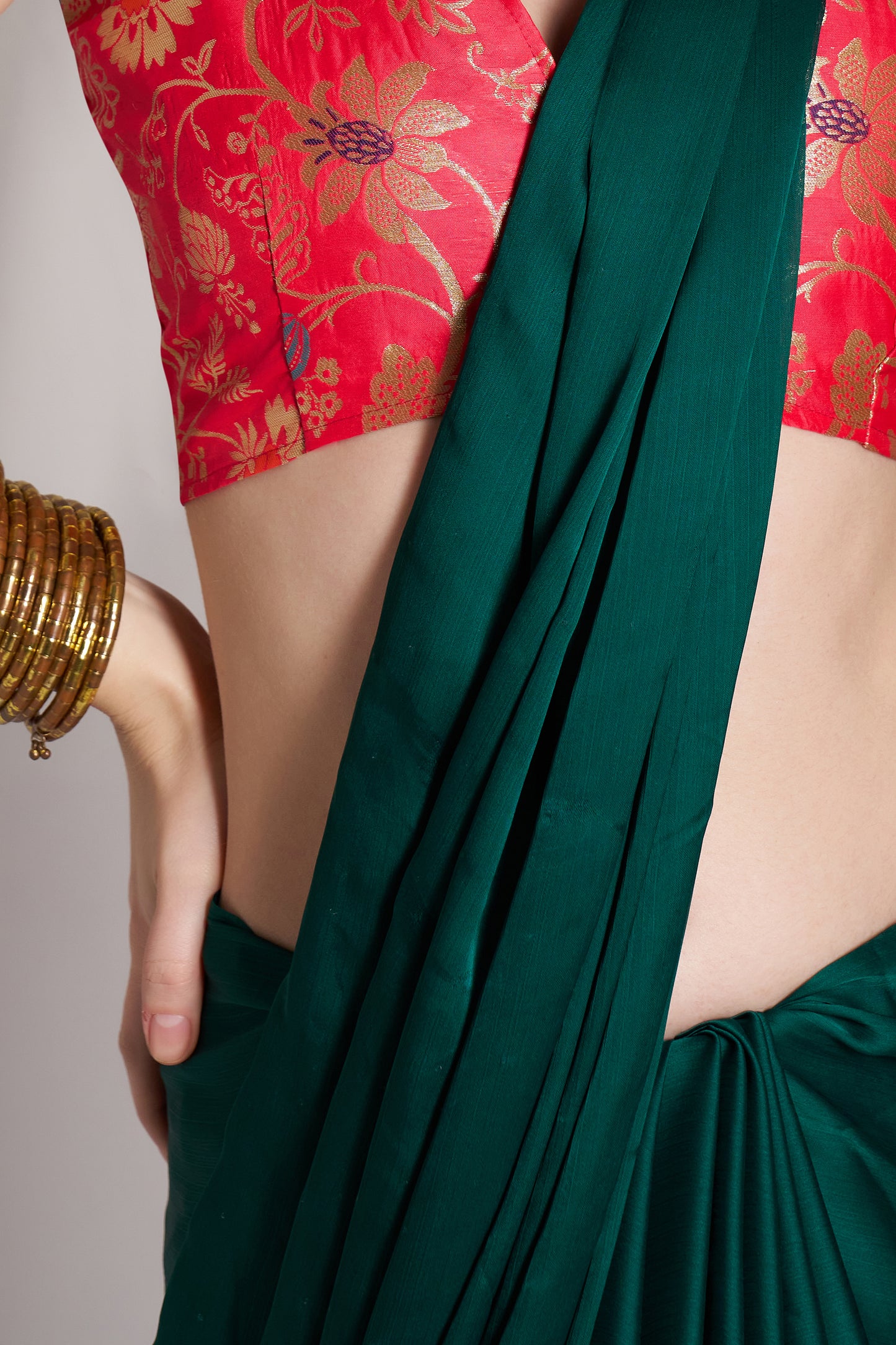 Green color chiffon fabric saree with designer lace and unstitched blouse