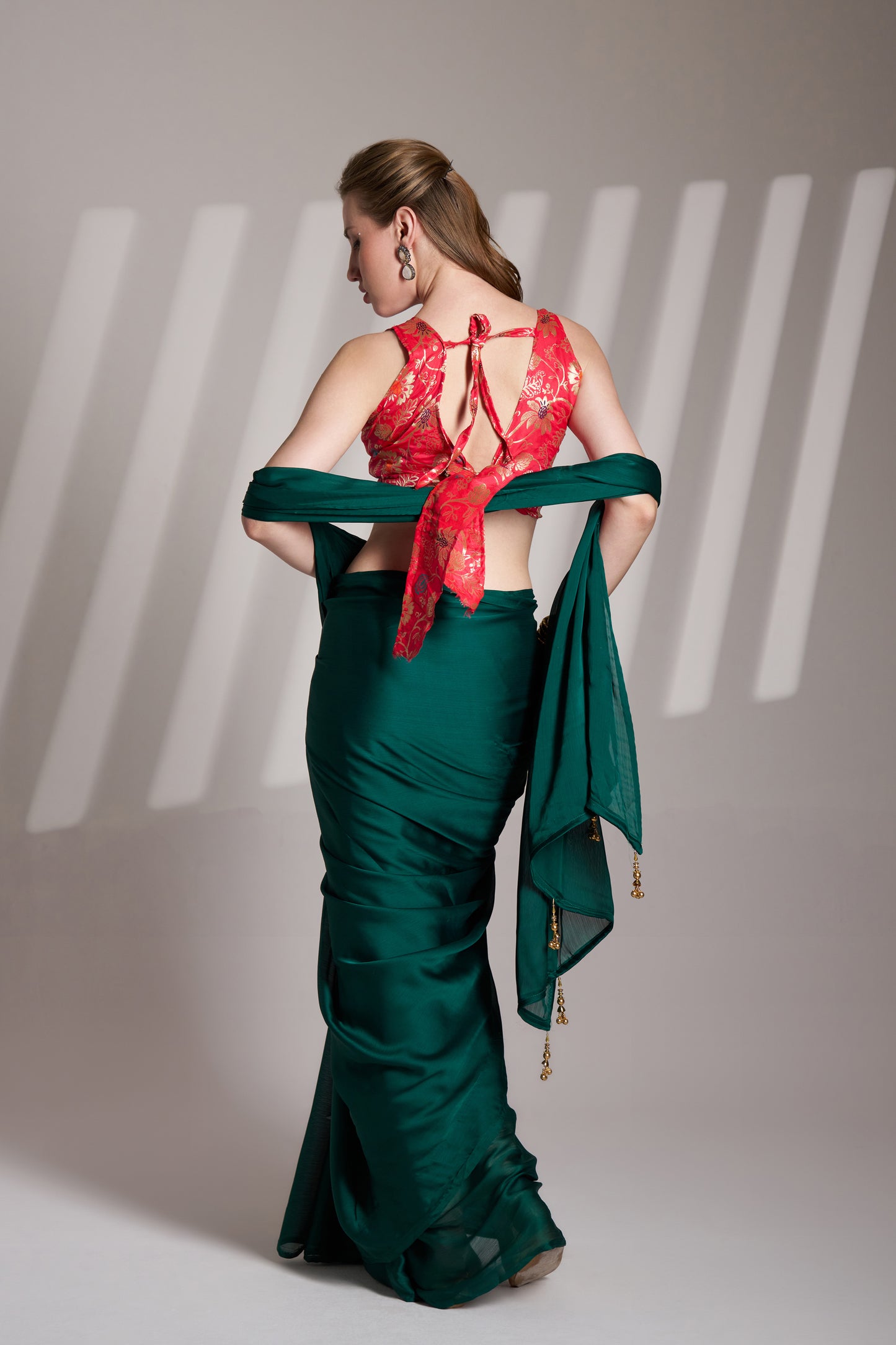 Green color chiffon fabric saree with designer lace and unstitched blouse