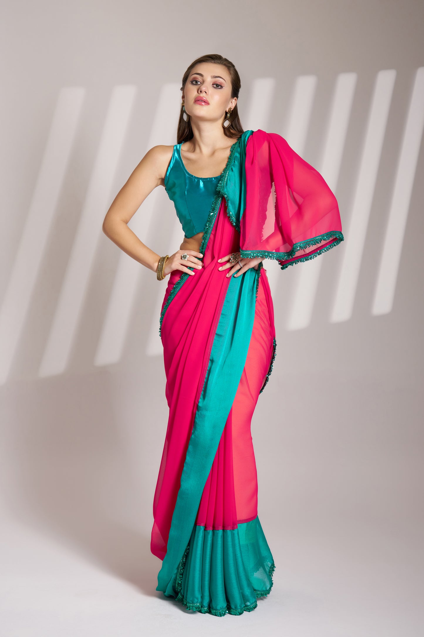 Stunning Georgette Saree in Crimson Red & Turquoise Blue with Designer Lace