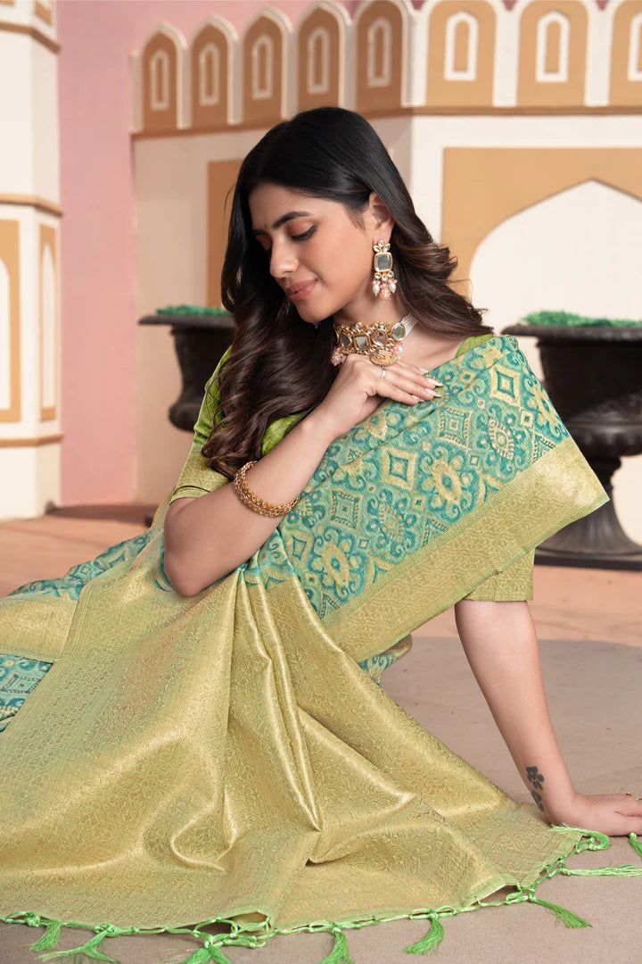 Vastraan Green Ikat Silk Saree – Zari Woven Elegance