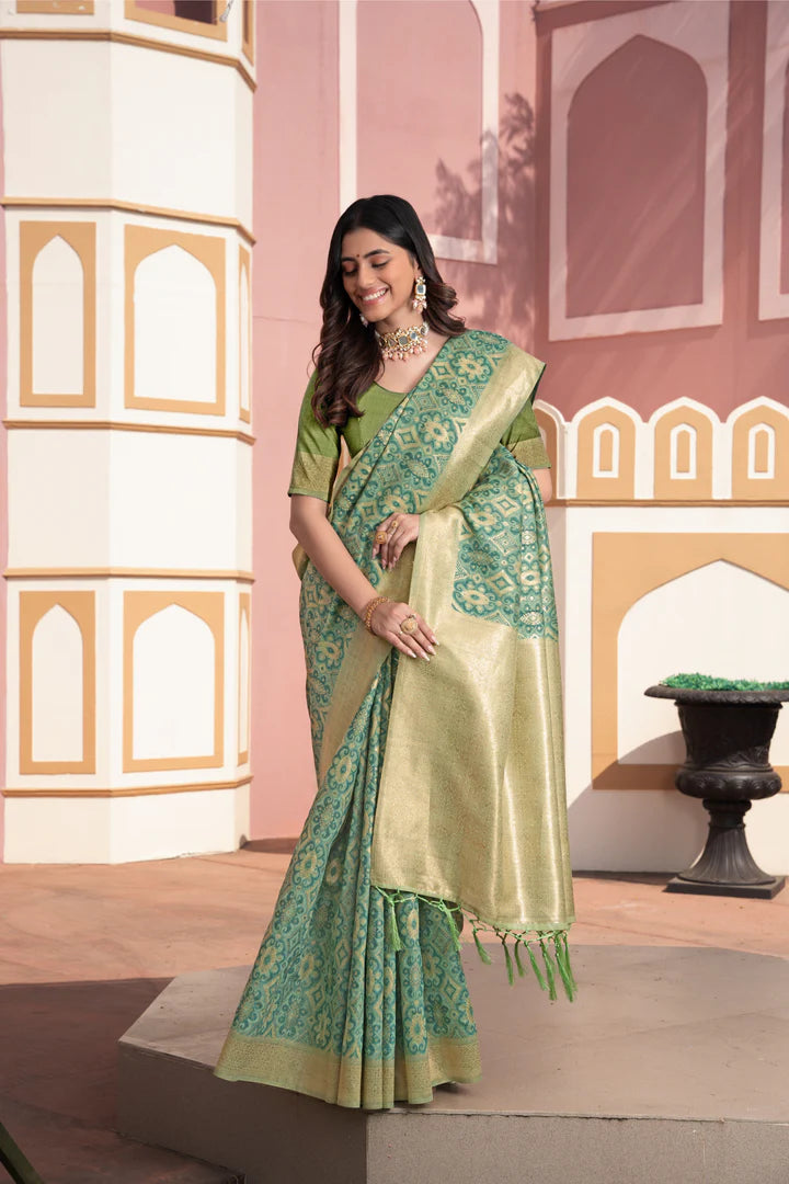 Vastraan Green Ikat Silk Saree – Zari Woven Elegance