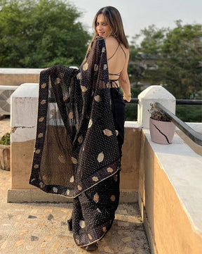 Elegant Black Georgette Saree with Luxe Piping and Lace