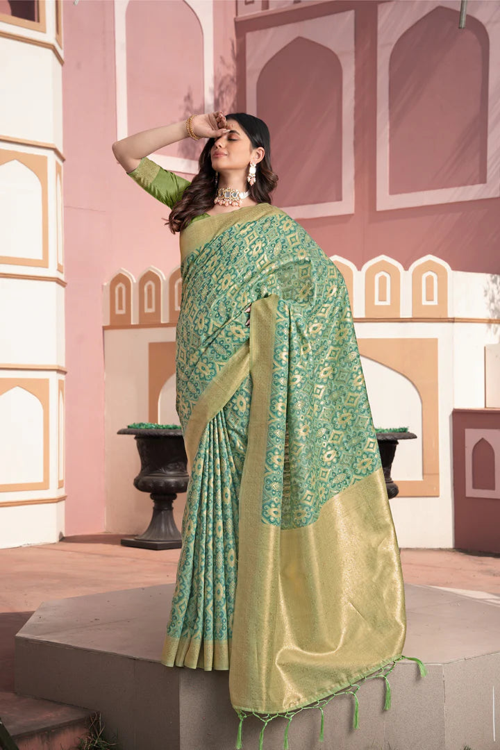 Vastraan Green Ikat Silk Saree – Zari Woven Elegance