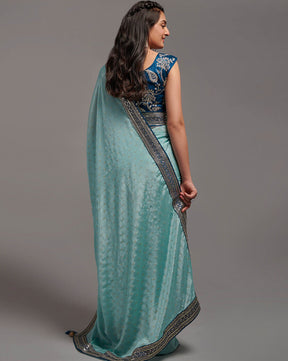 Gorgeous Turquoise Chinon Saree with Zari Lace