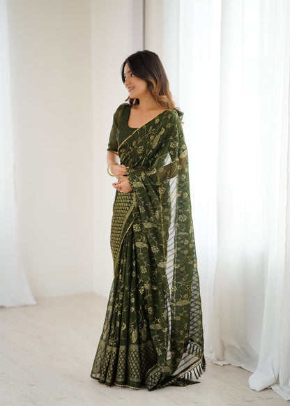 Elegant Mehandi Color Georgette Party Wear Saree with Foil Print & Fancy Zalar Lace