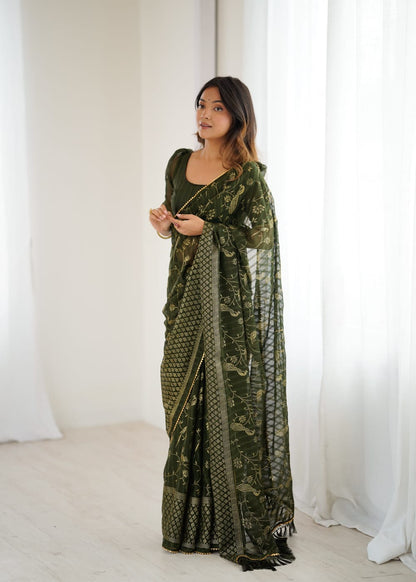 Elegant Mehandi Color Georgette Party Wear Saree with Foil Print & Fancy Zalar Lace
