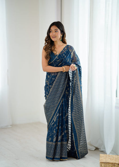 Elegant Morpitch Color Georgette Party Wear Saree with Foil Print & Fancy Zalar Lace