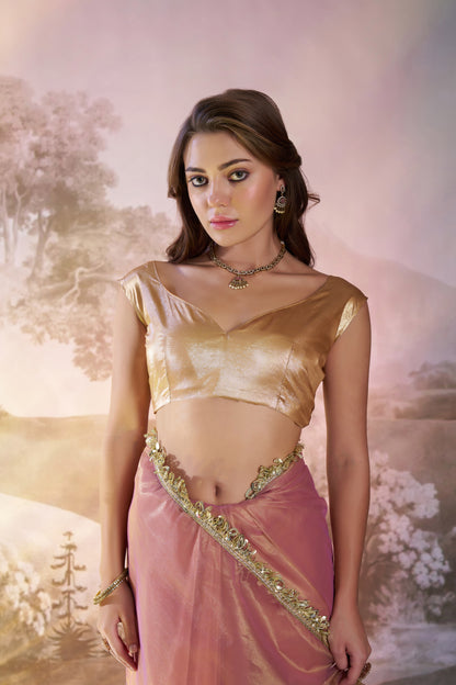 Light peach twill net saree with designer lace and unstitched blouse