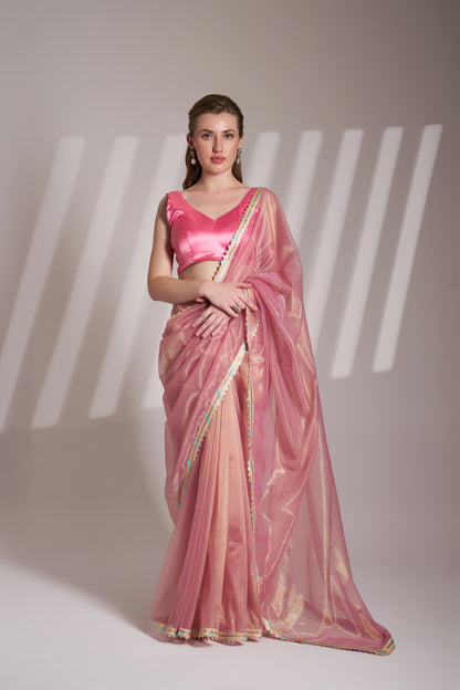 Light pink twill net saree with designer lace and unstitched blouse