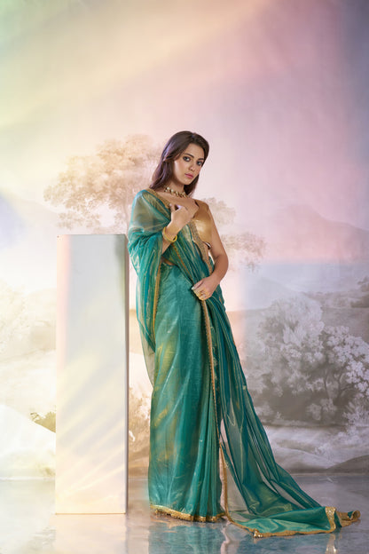 Sea green Color twill net saree with designer lace and unstitched blouse