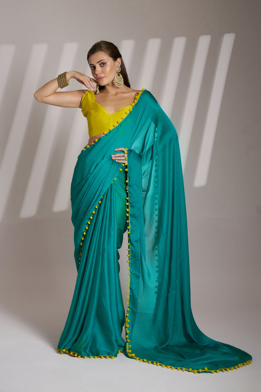 Sea Green color chiffon fabric saree with designer lace and unstitched blouse