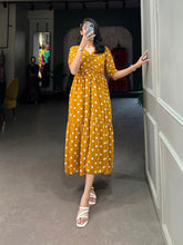 Amazing Yellow Color Georgette Polka Dot Print Gown